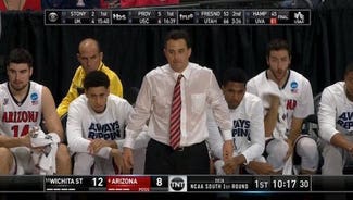 Next Story Image: Arizona's Sean Miller was sweating so bad it looked like he was coaching from a pool